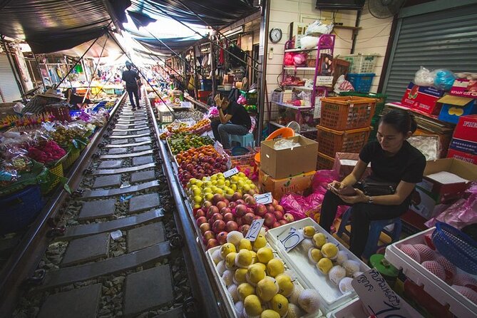 Maeklong Railway Market and Damnoen Saduak Floating Market Tour From Bangkok - The train ride segment: a fun reality check on a working rail line