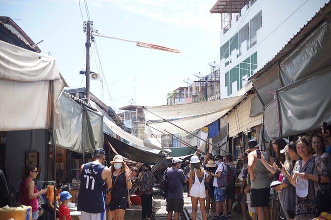 Maeklong Railway Market and Floating Market - Who should book this Maeklong and Damnoen Saduak tour?