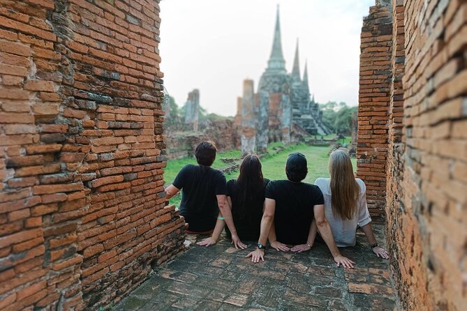 PRIVATE Ayutthaya + SUNSET Boat Tour + Light up The NIGHT - Wat Mahathat: Laterite Walls and the Headless Buddha Images