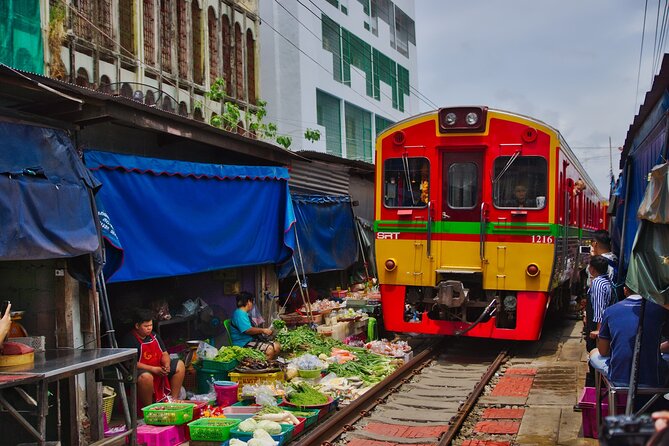 Private Floating Market and Maeklong Railway Market Day Tour - Maeklong Railway Market, trains right by the stalls