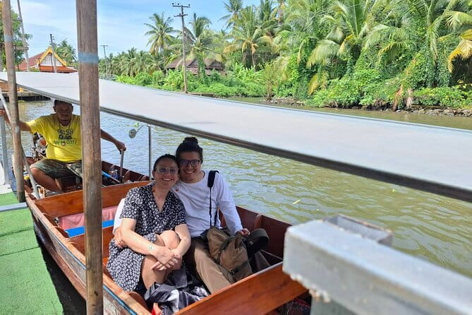 Private Tour to Maeklong Train Market and Floating Market - Damnoen Saduak floating market: goods from longtail boats