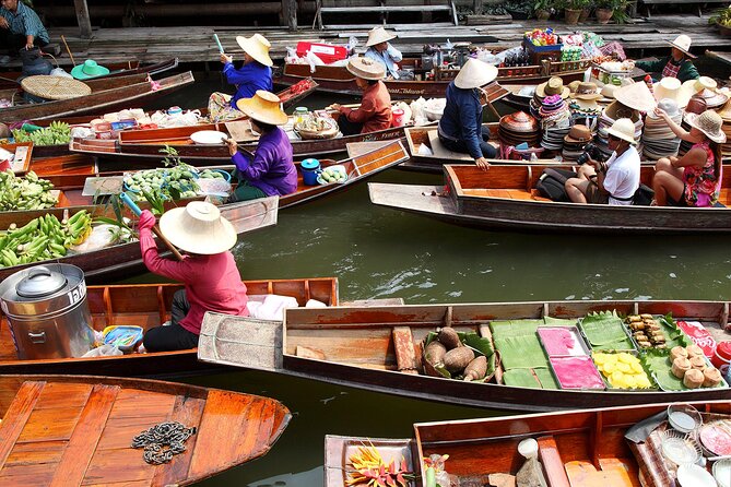 Private Tour to Railway Market and Damnoen Saduak Floating Market - Maeklong Railway Market: Watching the Train Through the Market