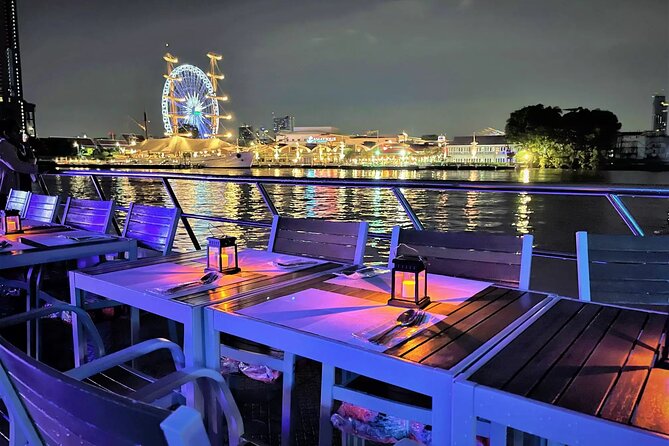 Smile Dinner Cruise Experience: Dining & Live Entertainment - Night skyline passes: Grand Palace and Temple of Dawn depend on tides
