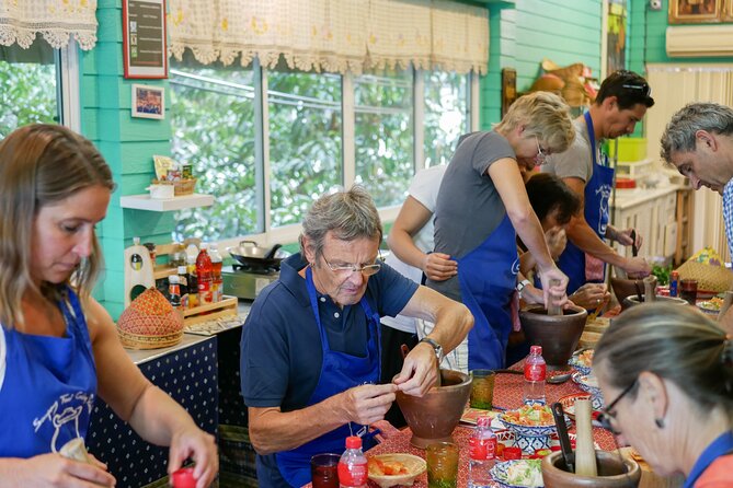 Sompong Thai Cooking School - Your teacher June and the style that keeps you cooking