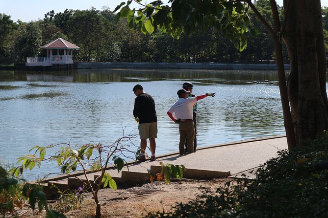 Take a E-Scooter Ride in Bangkok's Jungle - Sri Nakhon Khuean Khan Park: Lake, Fish, and Shade