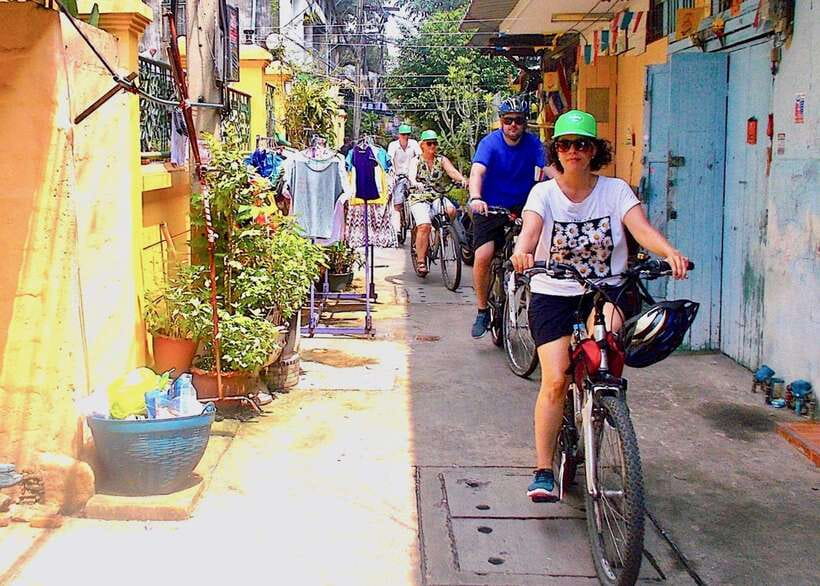 Thai culture and Bangkok local life guided bike tour - River crossing and temple stops that slow your pace