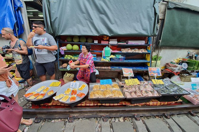 Train & Floating Market Food Adventure + Scenic train ride - Guide quality is a real part of the value