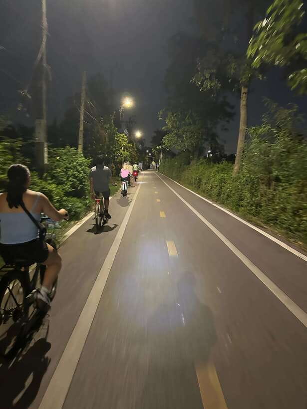 Twilight Firefly Bangkok Bicycle Tour - Cycling through low-traffic jungle paths on a real bike tour