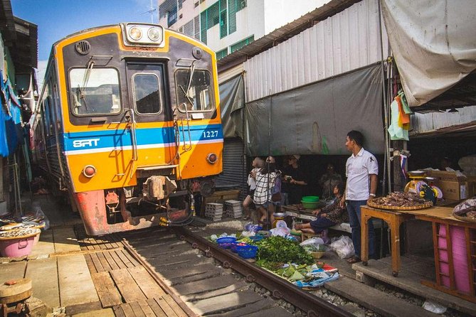 Unique Bangkok Markets: Train Market & Floating Market Adventure - Price and Logistics: Is This $82.65 Half-Day Good Value?